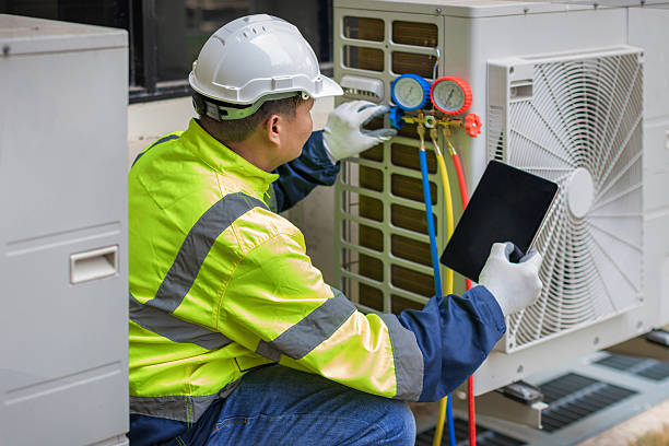 Professional Hvac technician working in Mulga, AL